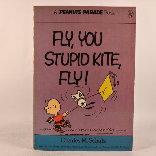 Fly, you stupid kite, fly! af Charles M. Schulz